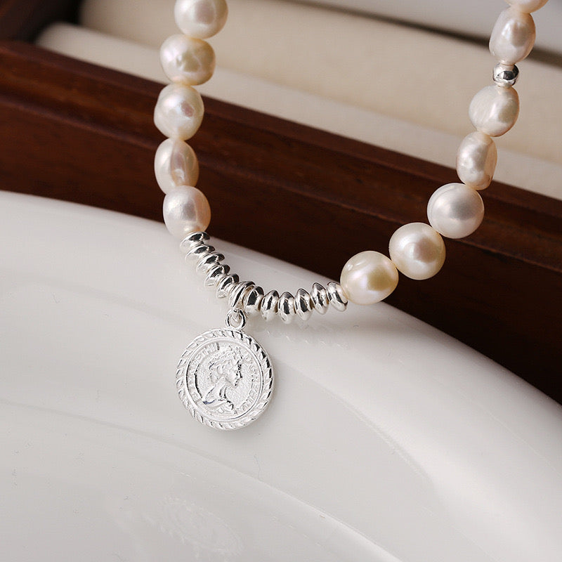 “Pearl Aura” Silver Coin Baroque Pearl Strand