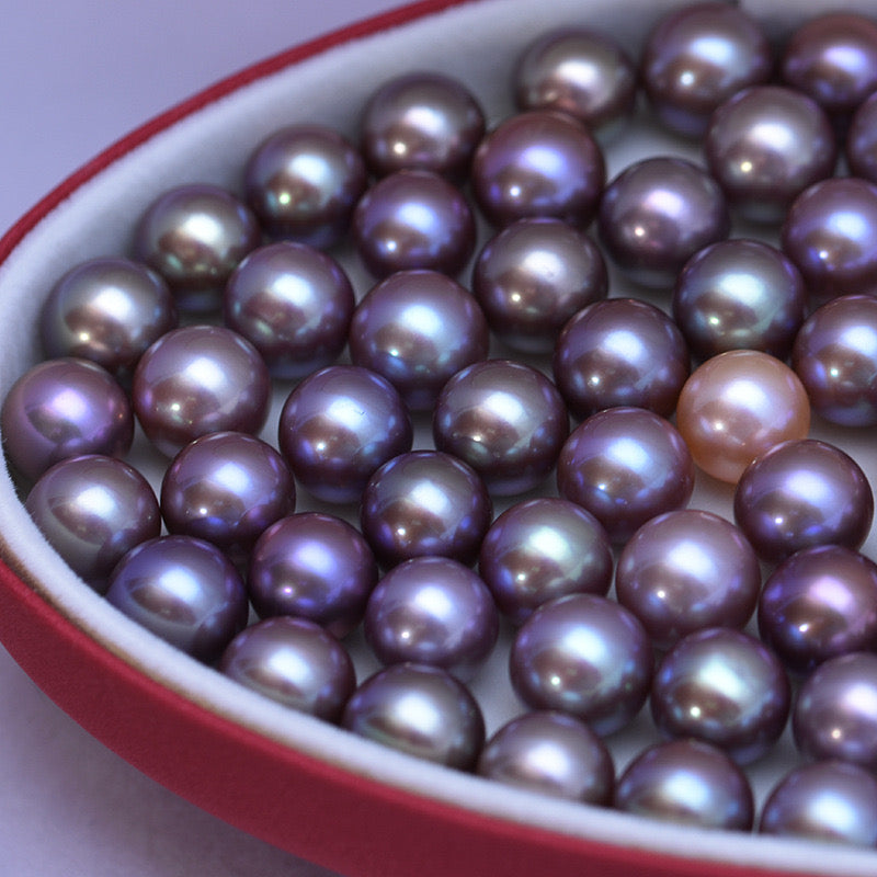 “Pearl Aura” Purple/pink round Pearls