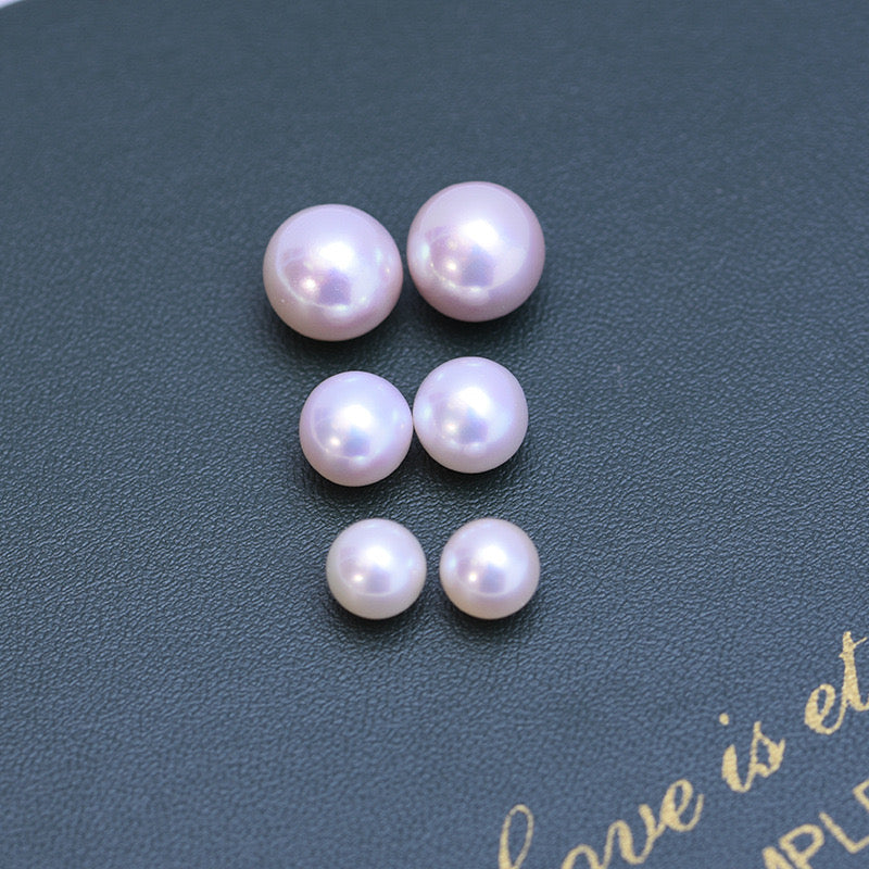 “Pearl Aura” White round Pearls